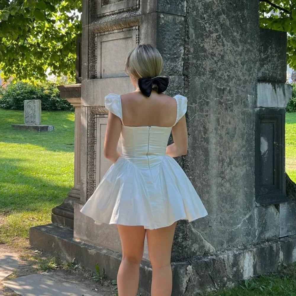 Blanca | Flirty Cape Sleeve Mini